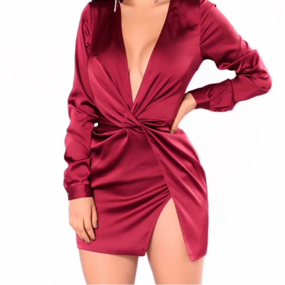 Selling this super cute satin burgundy cocktail dress. It is medium in size.